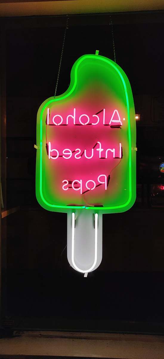 2622 clover st pink alcohol infused pops neon signage dallas